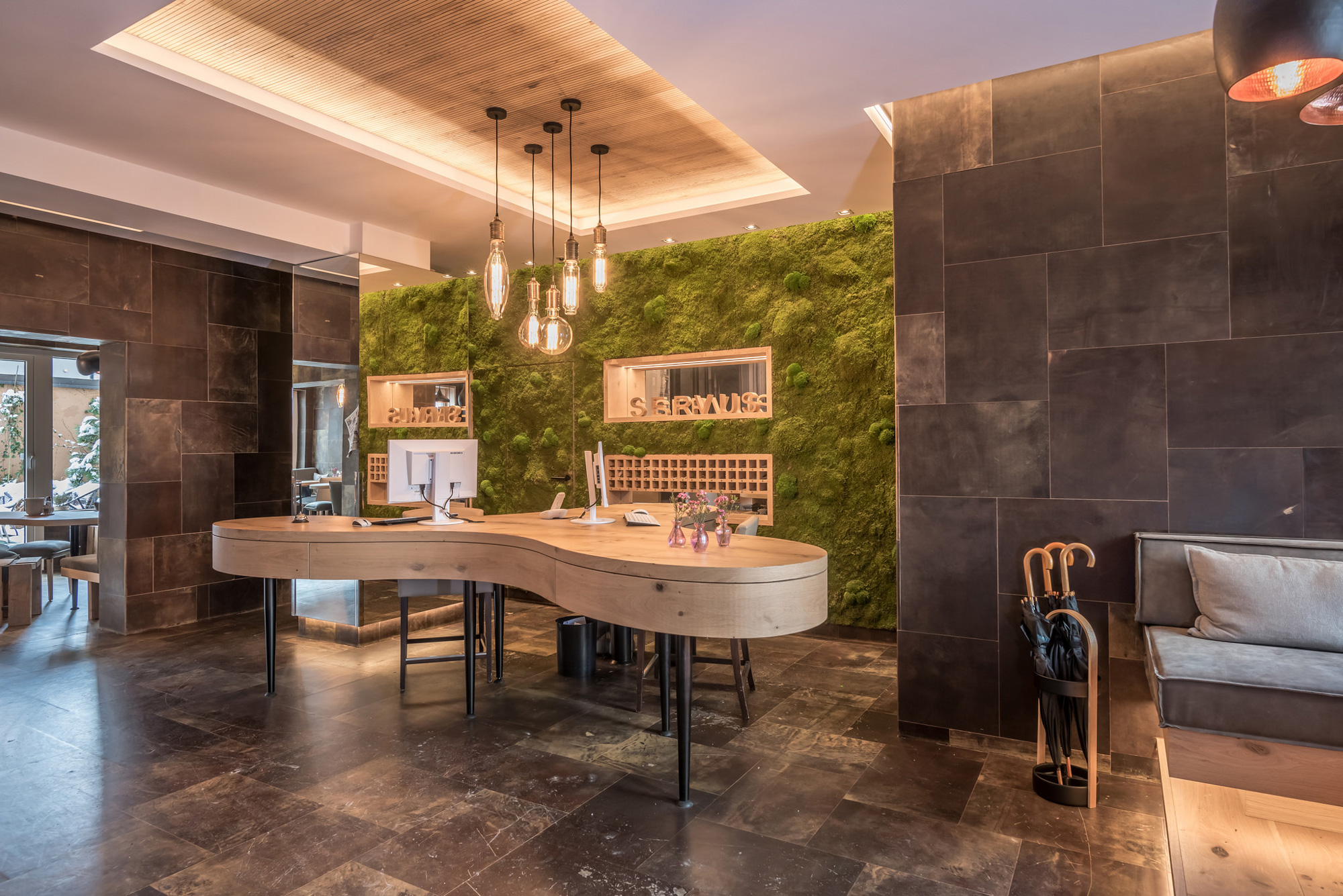 Freund Greenwood moss wall, wall panels with preserved forest moss combined with leather tiles, Boutique Hotel Munich